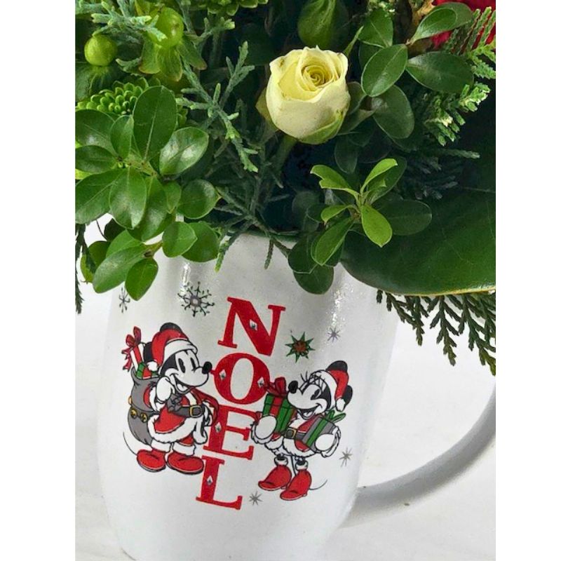 A Cup of Christmas Joy Floral Arrangement