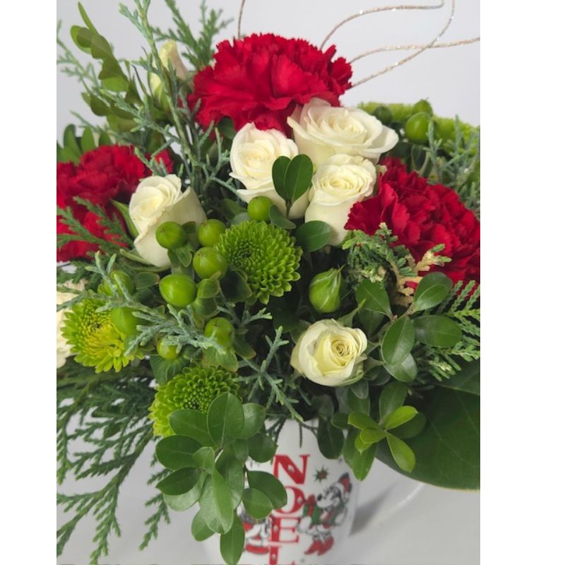 A Cup of Christmas Joy Floral Arrangement